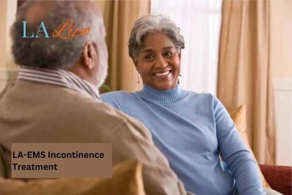 Couple sat smiling at each other - LA-EMS treatment West Hendon