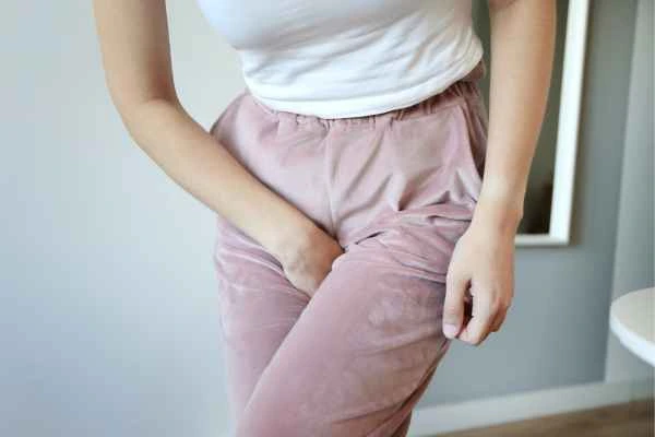 older woman running to the toilet because of urinary incontinence West Hendon