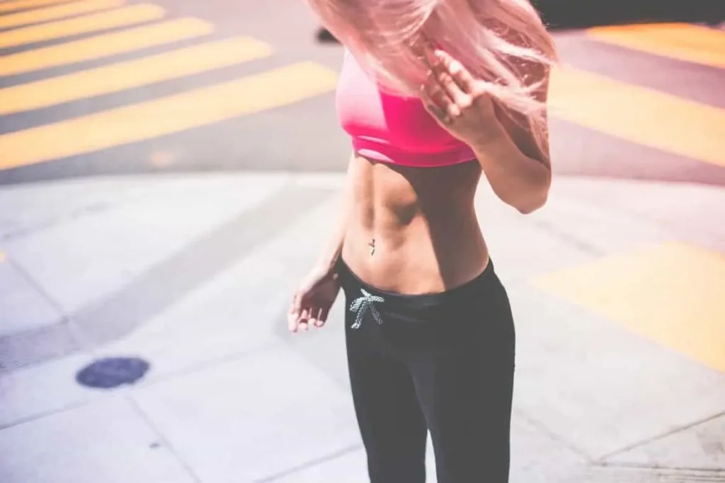 Woman with toned stomach after LA-EMS Body Sculpting Treatment West Hendon
